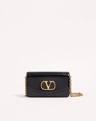 Valentino Garavani Vain Clutch Bag In Shiny Calfskin