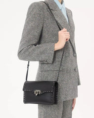 Small Rockstud Grainy Calfskin Crossbody Bag